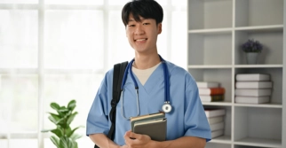 A male nurse smiling